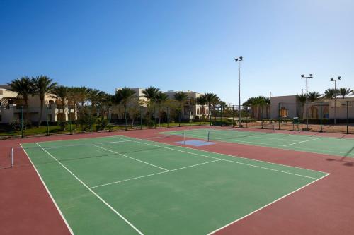 a tennis court with two tennis courts at JAZ Belvedere in Sharm El Sheikh