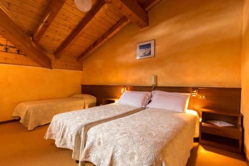 Llit o llits en una habitació de Hotel Punta Cian