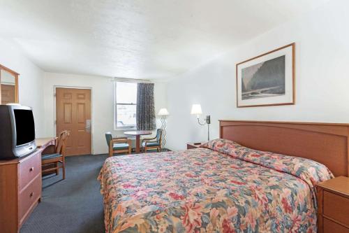 En eller flere senge i et værelse på Knights Inn Wendover