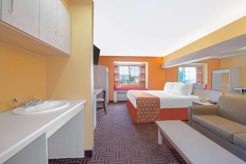 A seating area at Microtel Inn & Suites by Wyndham Amarillo