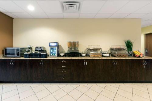 a counter in a room with some food on it at Microtel Inn and Suites Eagle Pass in Eagle Pass