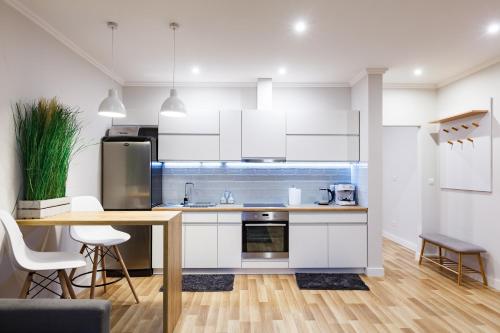 Kuchyň nebo kuchyňský kout v ubytování MW apartments