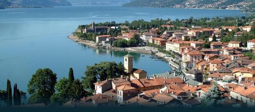 an aerial view of a small town on a lake at Residenza Christian in Gravedona