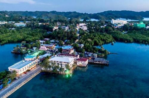 an aerial view of an island in the water at Ocean Star Hotel in Koror