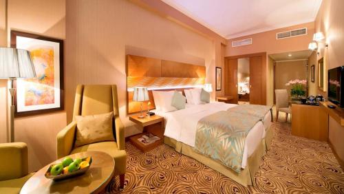 Postel nebo postele na pokoji v ubytování Coral Baghdad Hotel