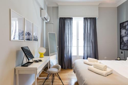 Posteľ alebo postele v izbe v ubytovaní Acropolis Heart 1BD Apartment in Plaka by UPSTREET