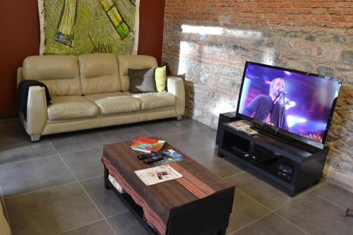 TV a/nebo společenská místnost v ubytování Posada Boutique Las Terrazas