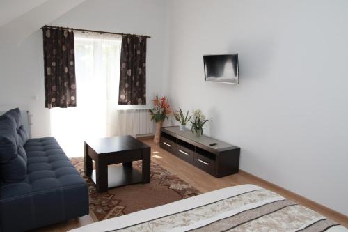 Μια τηλεόραση ή/και κέντρο ψυχαγωγίας στο Apartments on Drohobytska 6b