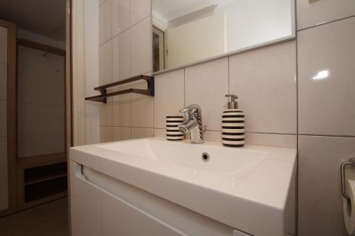 Kylpyhuone majoituspaikassa Apartment Vedro