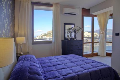 Ένα ή περισσότερα κρεβάτια σε δωμάτιο στο B & B La Terrazza sul mare