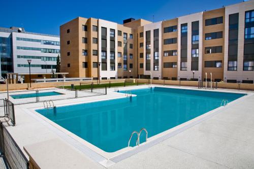 Bazén v ubytování Compostela Suites nebo v jeho okolí