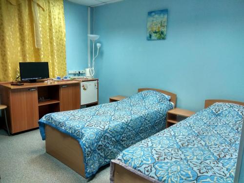 Кровать или кровати в номере Гостиница Кстово