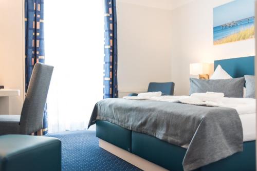 Cama o camas de una habitación en Haffidyll garni