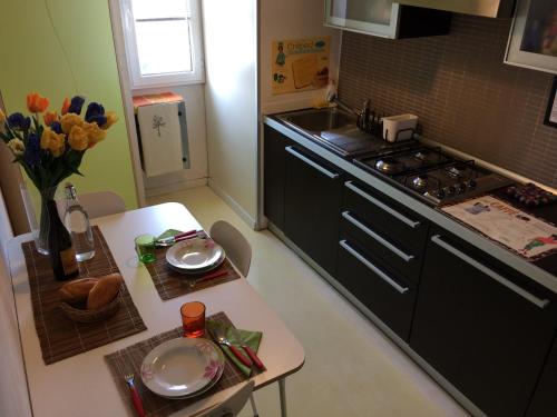 Smart apartment Mare & Movidaにあるキッチンまたは簡易キッチン