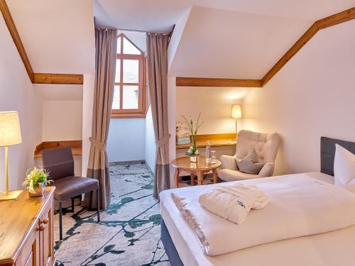 Postel nebo postele na pokoji v ubytování Hotel Fürstenhof - Wellness- und Golfhotel