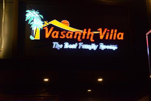 a sign for the best family tv show at Vasanth Villa in Kanchipuram