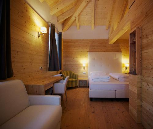 Una cama o camas en una habitación de Hotel Costabella