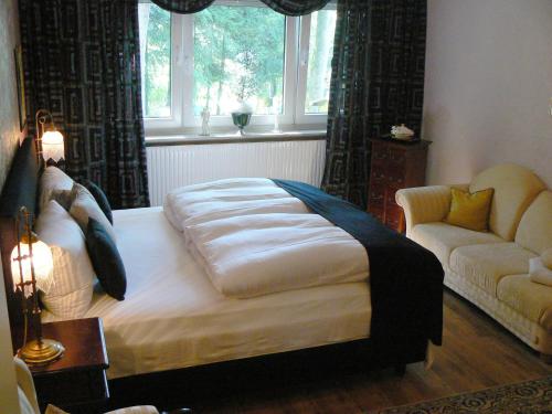 Postel nebo postele na pokoji v ubytování Waldhotel "Peter aufm Berge"