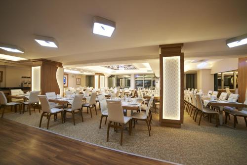 Restaurant ou autre lieu de restauration dans l'établissement Soyic Hotel