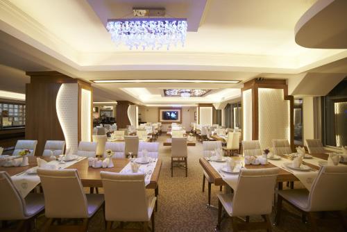Restaurant ou autre lieu de restauration dans l'établissement Soyic Hotel