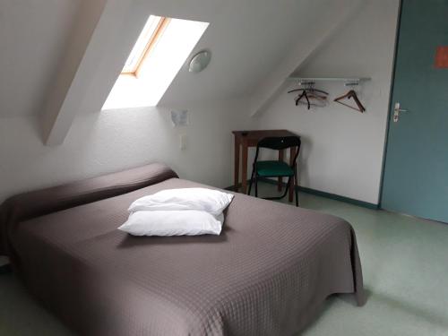Кровать или кровати в номере Le Saint Mary