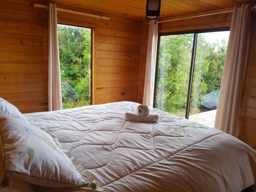 Lova arba lovos apgyvendinimo įstaigoje Cabana Chiloe