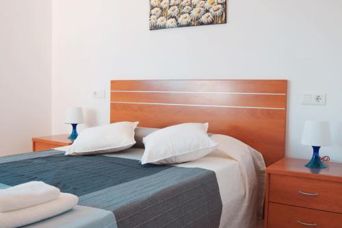 A bed or beds in a room at Casa Sastre