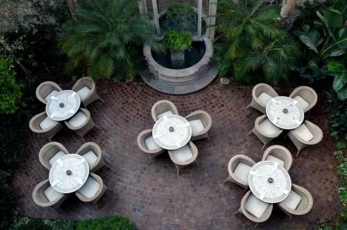 an overhead view of tables and chairs on a patio at Hotel Casa Blanca 7 in San Miguel de Allende