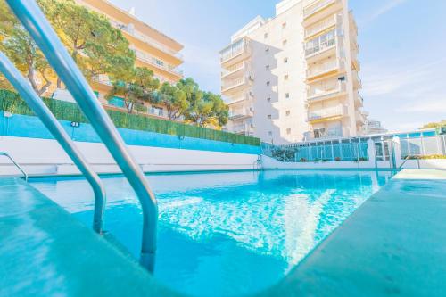 Бассейн в Apartamento Familiar Leomar или поблизости