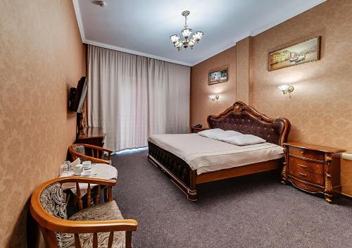 Posteľ alebo postele v izbe v ubytovaní Venecia Hotel & SPA