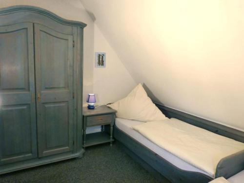 Posteľ alebo postele v izbe v ubytovaní Hüs Sanskiin Ferienwohnung *Eerdglüper*