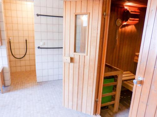 a bathroom with a shower and a toilet in it at Haus Therese *FeWo 7* in Wittdün