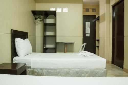 เตียงในห้องที่ GV Hotel - Valencia