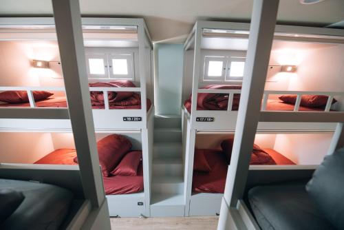 a group of bunk beds in a room at Daegu Midtown Hostel in Daegu