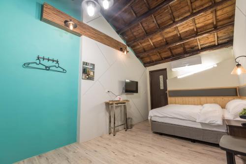 Cama o camas de una habitación en SeaRoad Homestay