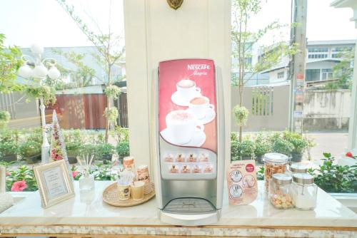 a display of a dessert machine on a table at Romance Hotel Sukhumvit 97 in Bangkok