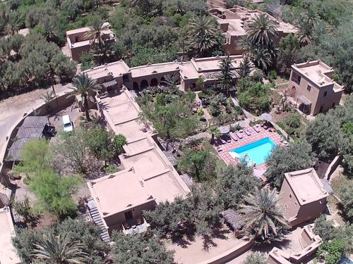 an aerial view of a house with a swimming pool at Dar Lorkam in Skoura