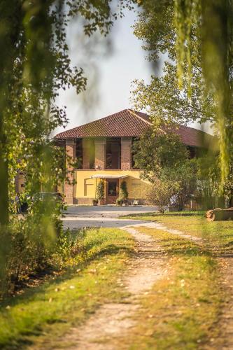 a house with a road in front of it at Cascina Gaggioli in Milan