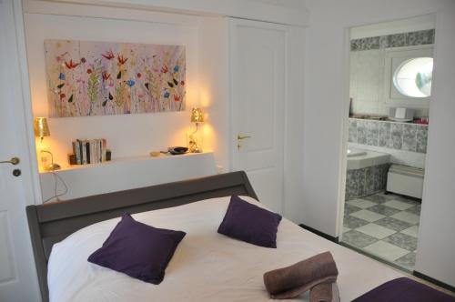 Ένα ή περισσότερα κρεβάτια σε δωμάτιο στο Clos San Gianni