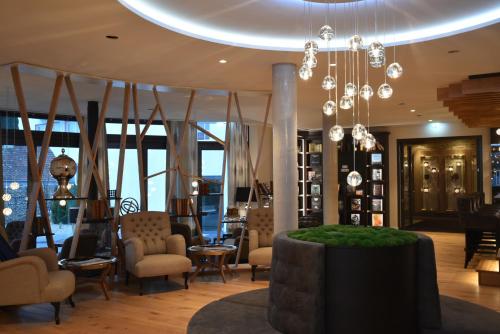 Coin salon dans l'établissement BLOCK Hotel & Living