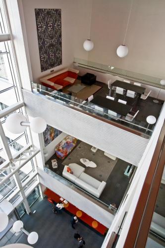 an overhead view of a living room from a loft at Axor Feria in Madrid