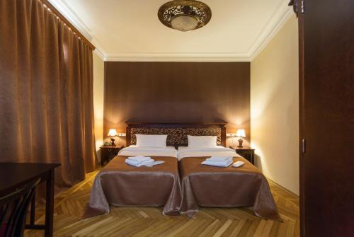 
Een bed of bedden in een kamer bij Tskaltubo Spa Resort
