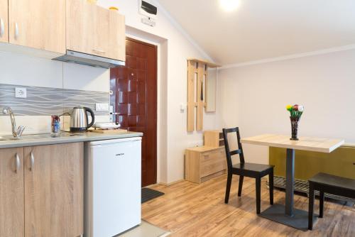 Kuchyň nebo kuchyňský kout v ubytování Athos Apartments