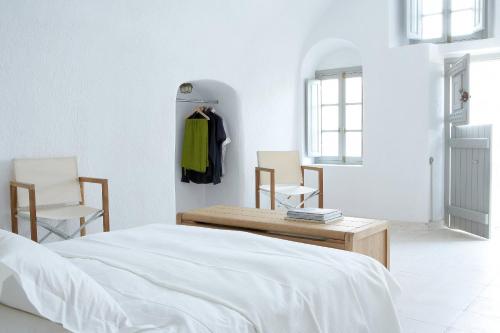 Postel nebo postele na pokoji v ubytování Villa Fabrica Santorini