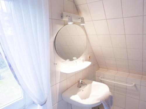 Et badeværelse på Haus *Üüs Aran* Wohnung Nr. 7