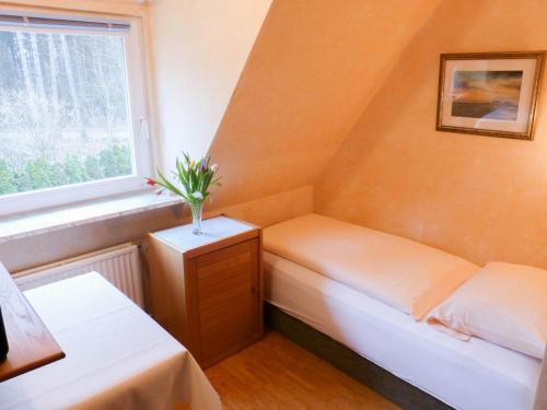 Giường trong phòng chung tại Haus *Üüs Aran* Wohnung Nr. 5
