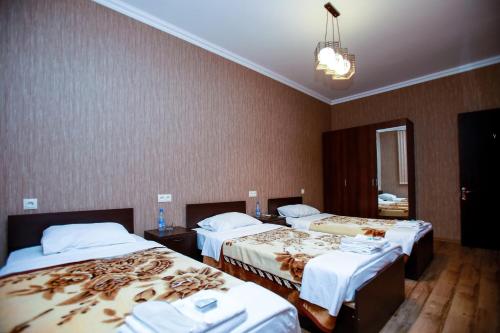 מיטה או מיטות בחדר ב-Hotel 4You