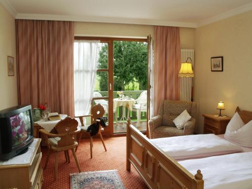 Postel nebo postele na pokoji v ubytování Xundheits Hotel Garni Eckershof