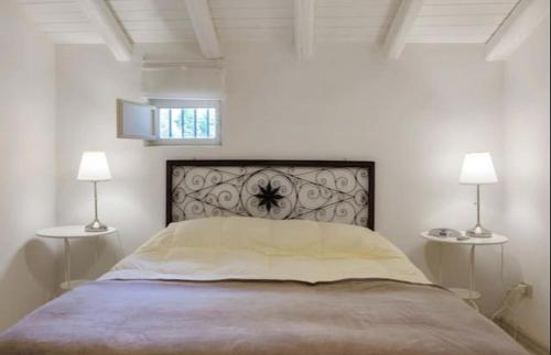 A bed or beds in a room at Pietra dell'Etna