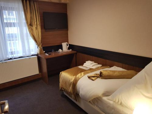 Katil atau katil-katil dalam bilik di Hotel im Anker